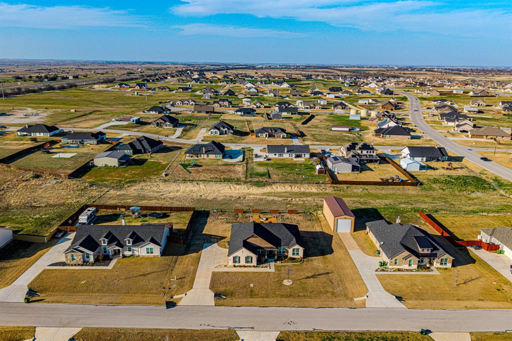 150 Oak Grove Drive Rhome, TX 76078 - Photo 38 of 40 an aerial view of residential houses with outdoor space