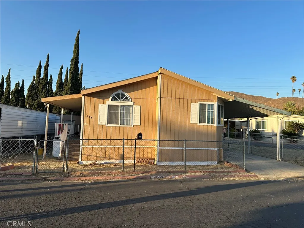 a front view of a house with a garage