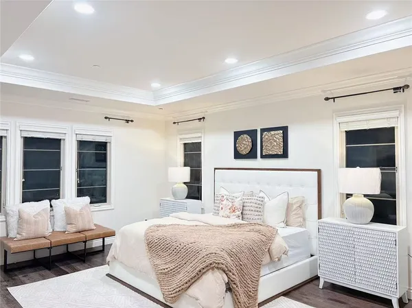 a view of an entryway with wooden floor
