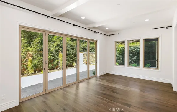 a bathroom with a double vanity sink and shower