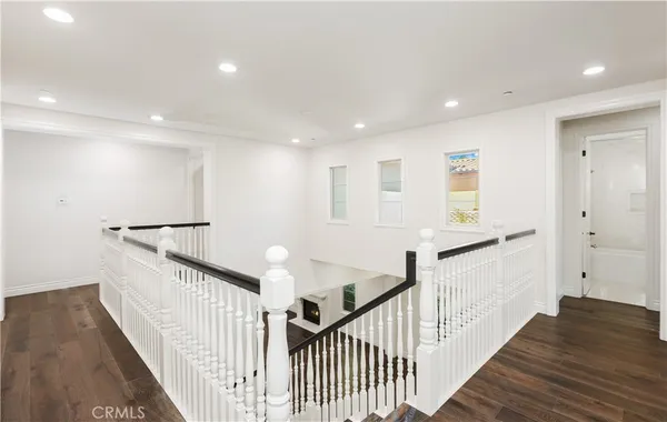 a view of a patio with table and chairs and potted plants