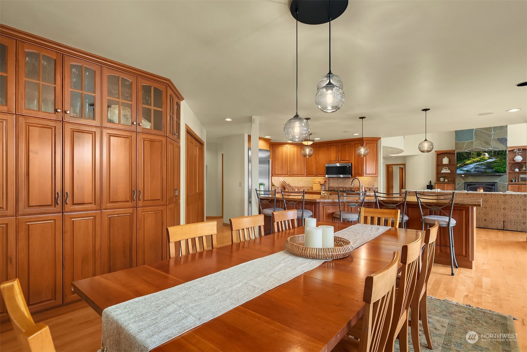 49 Strawberry Point Road Bellingham, WA 98229 - Photo 17 of 40 a large kitchen with a table and chairs