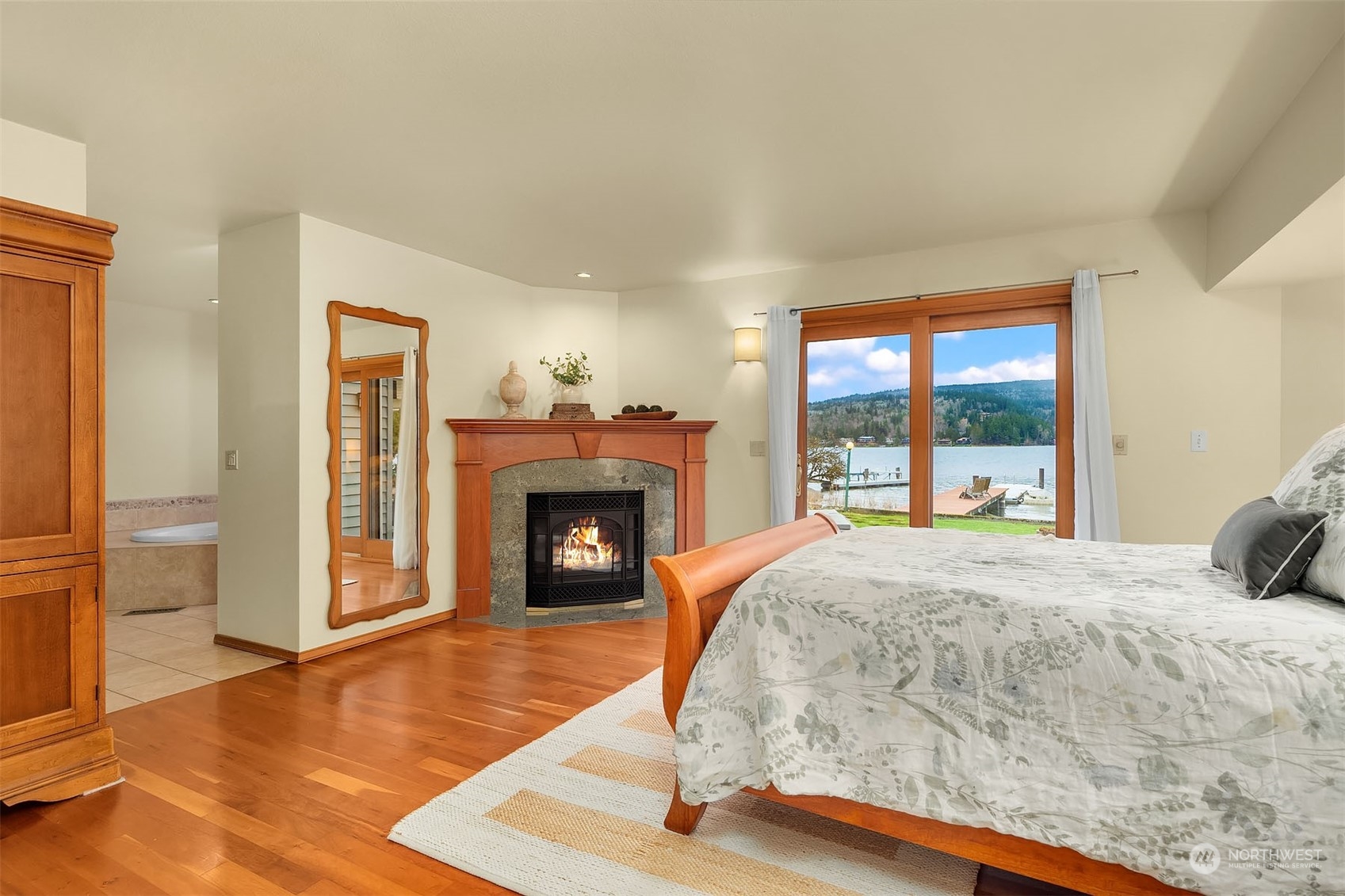 49 Strawberry Point Road Bellingham, WA 98229 - Photo 20 of 40 a bed sitting in a spacious bedroom next to a window