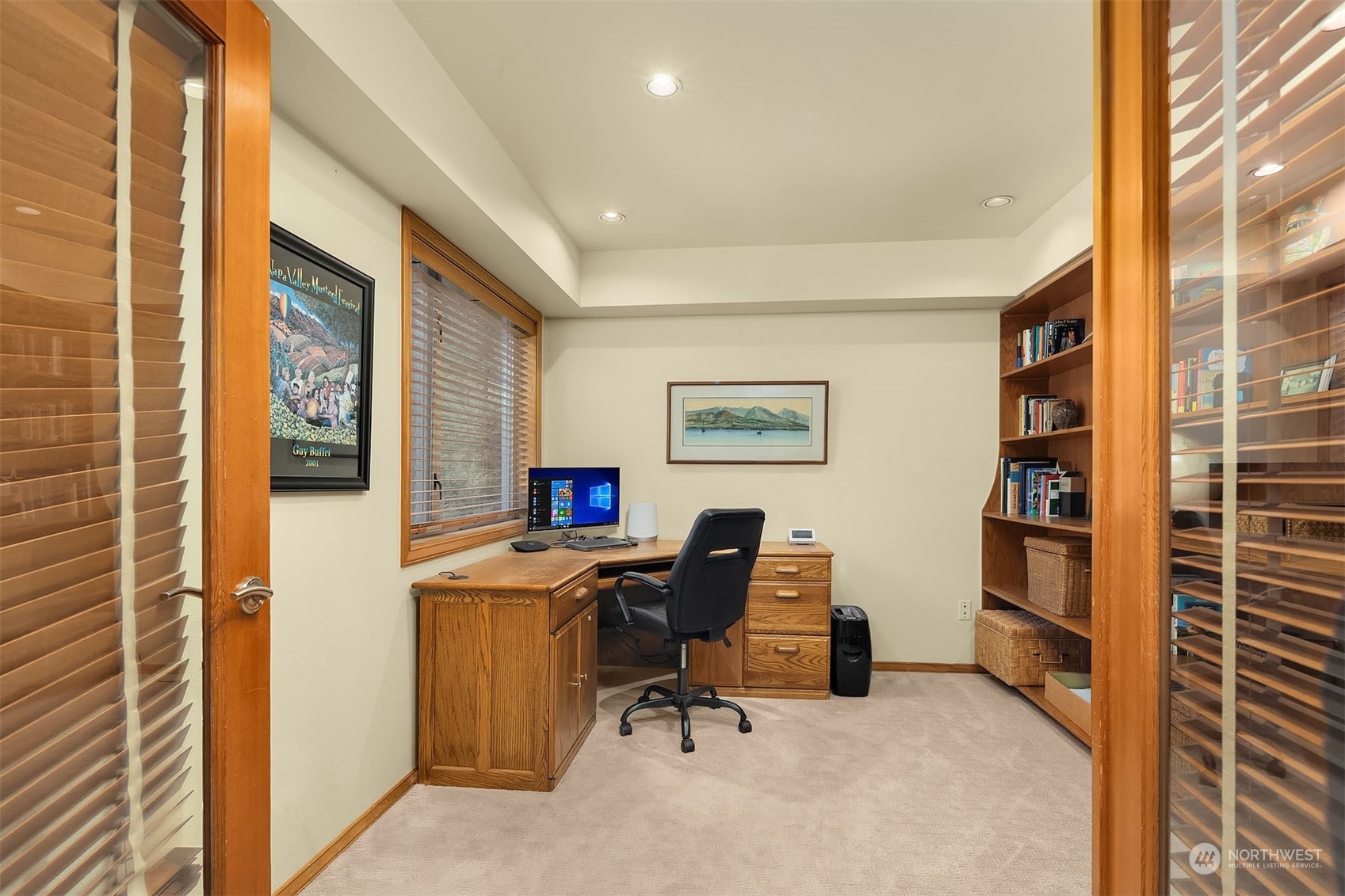 49 Strawberry Point Road Bellingham, WA 98229 - Photo 24 of 40 a view of a workspace with furniture and a window