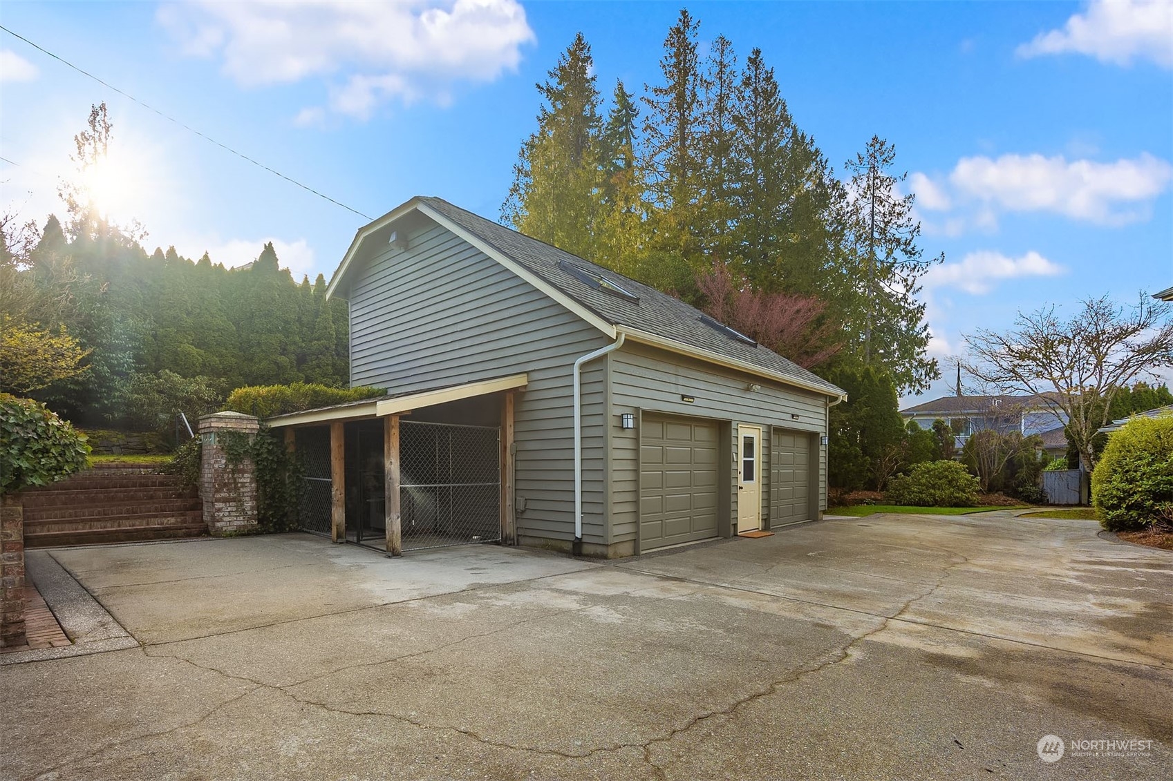 49 Strawberry Point Road Bellingham, WA 98229 - Photo 32 of 40 a view of a house with a yard