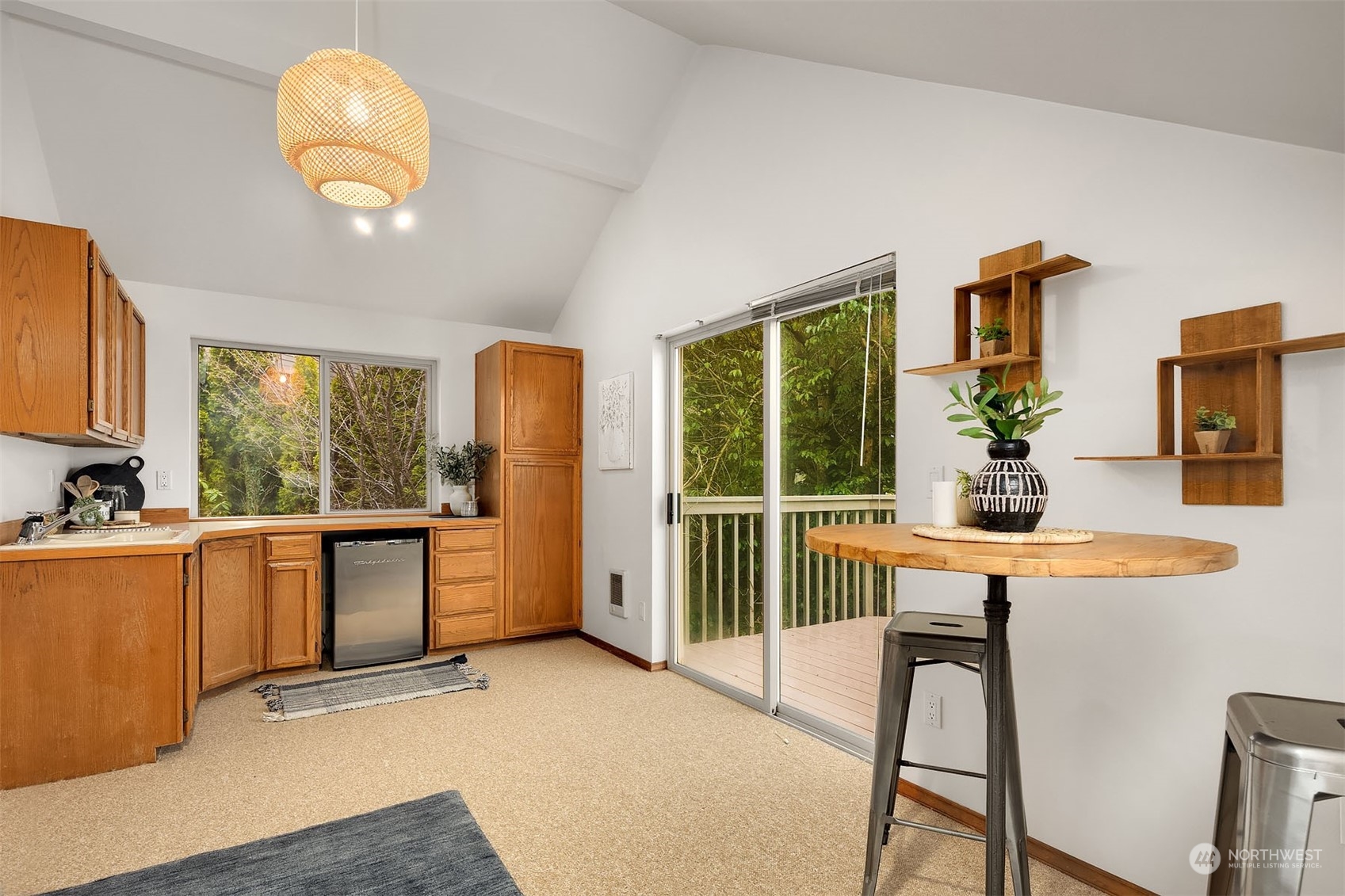 49 Strawberry Point Road Bellingham, WA 98229 - Photo 34 of 40 a view of a kitchen with a sink and a large window