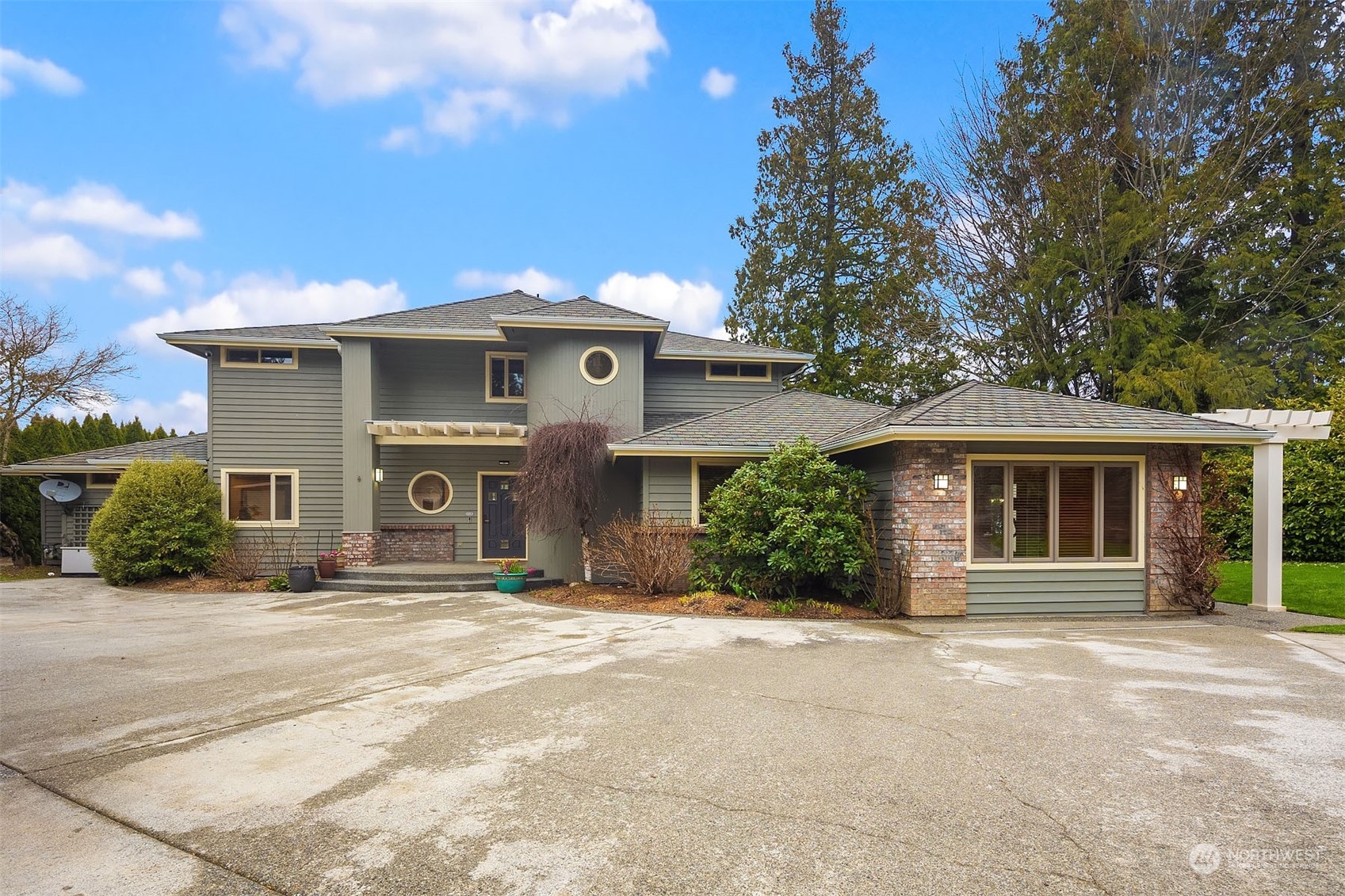 49 Strawberry Point Road Bellingham, WA 98229 - Photo 39 of 40 front view of a house with a porch