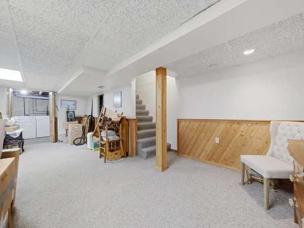 a view of livingroom with furniture and a couch