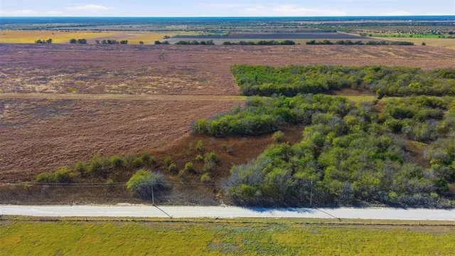 a view of a lake with a big yard