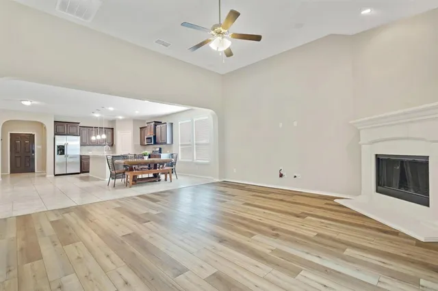 a view of a livingroom with furniture and a fireplace