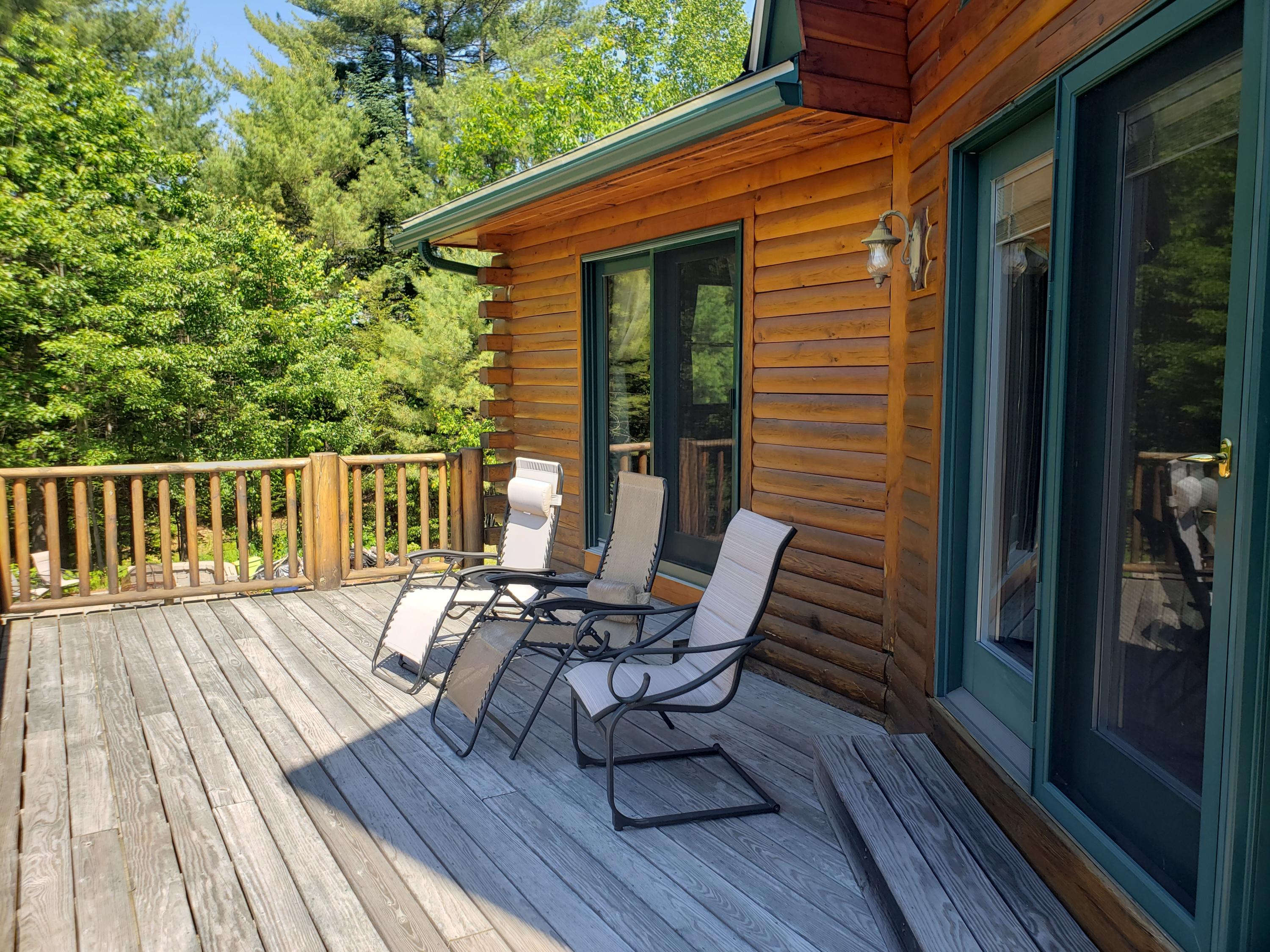 212 Campground Road Livermore Falls, ME 04254 - Photo 16 of 61 Extensive deck off living/dining rm.