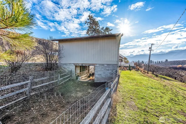 a view of a backyard with plants