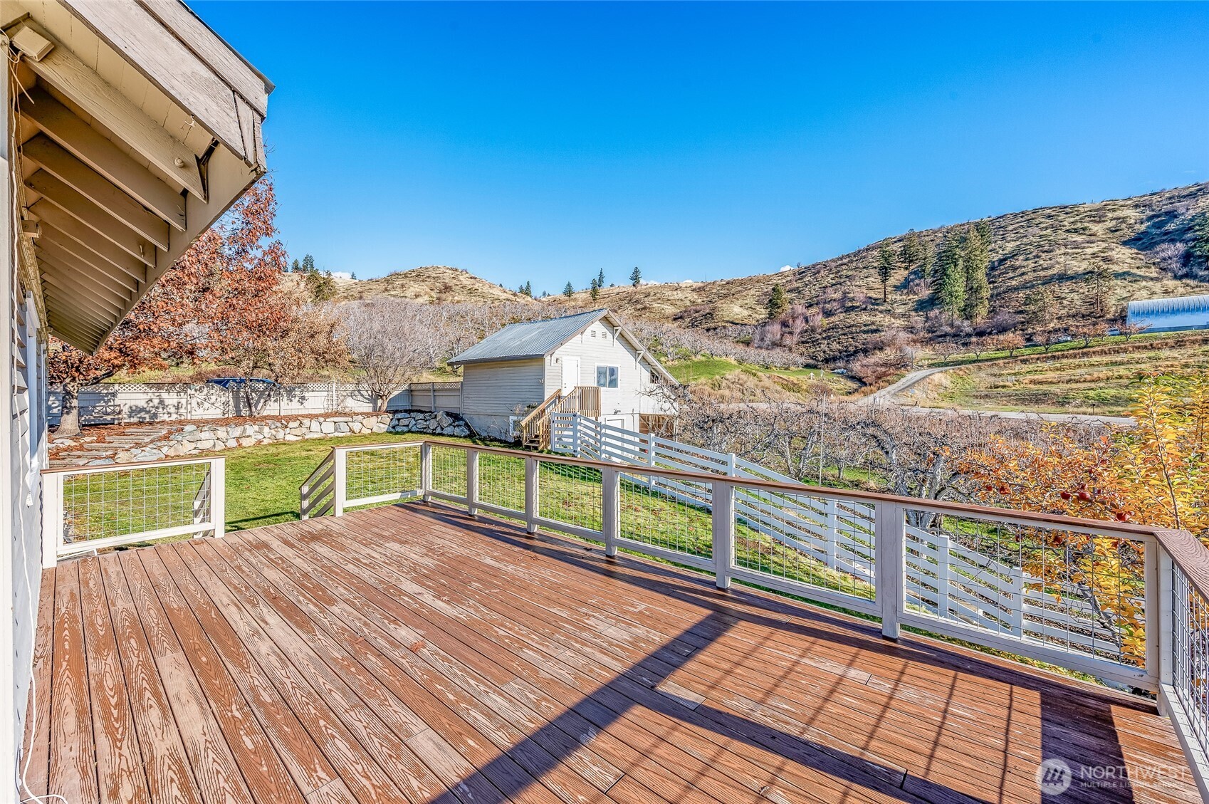 8133 North Dryden Road Cashmere, WA 98815 - Photo 6 of 36 a view of a balcony with an outdoor space