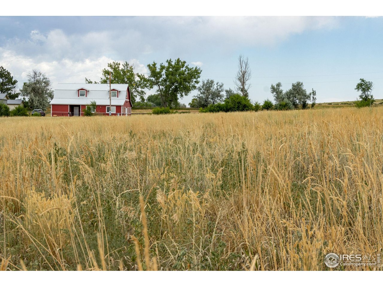 41885 Sage Hill Road Fort Collins, CO 80524 - Photo 20 of 30 a view of swimming pool and mountain in the back