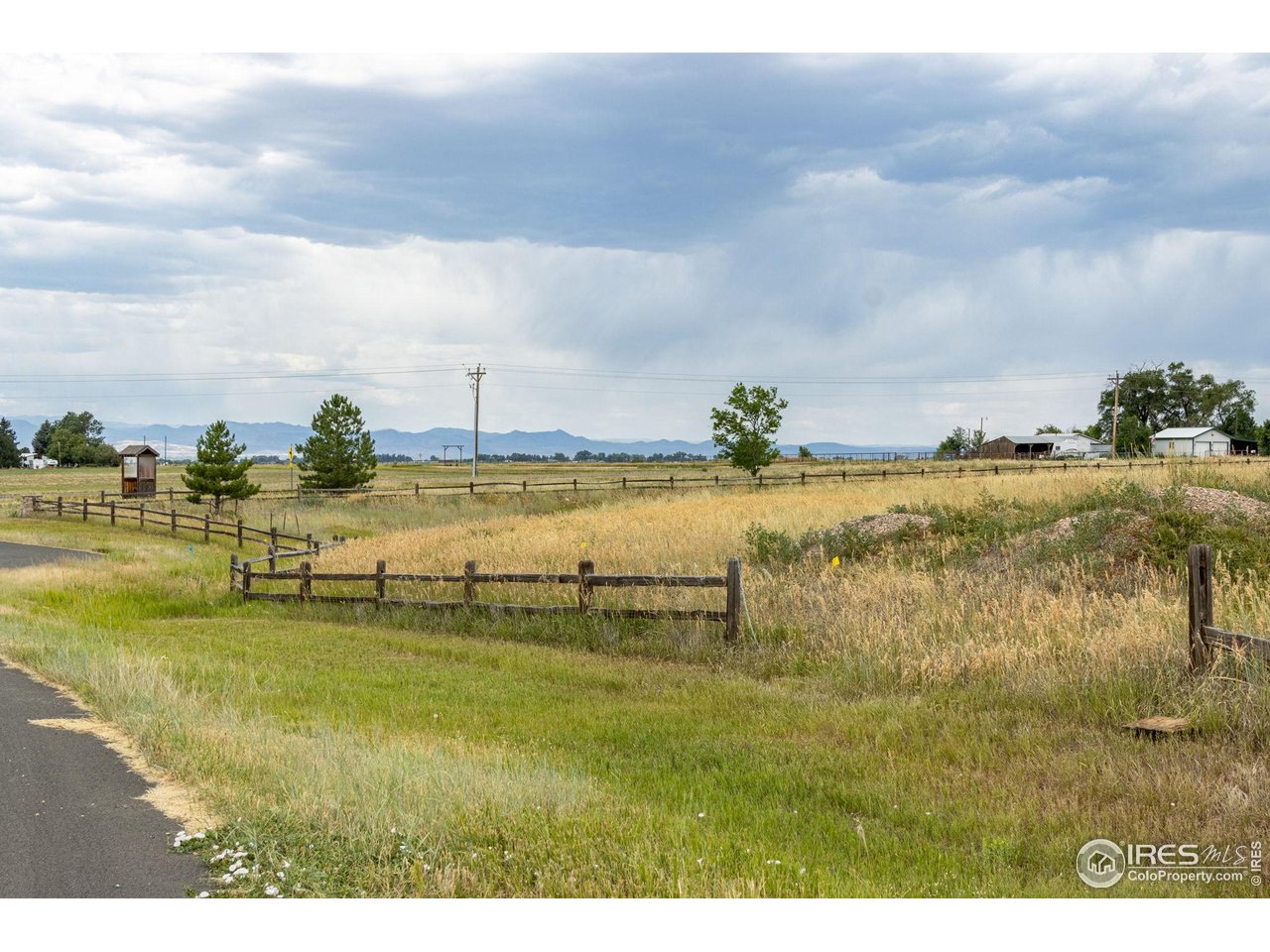 41885 Sage Hill Road Fort Collins, CO 80524 - Photo 8 of 30 a view of a lake with a big yard