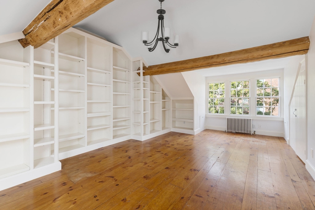 24 Fayette Street, Unit 24 Boston, MA 02116 - Photo 19 of 36 a view of empty room with wooden floor and fan