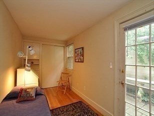 24 Fayette Street, Unit 24 Boston, MA 02116 - Photo 22 of 36 a room with a couch and a table