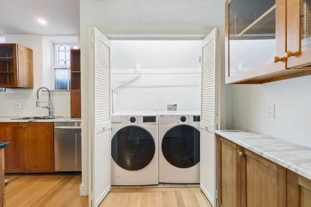 a view of kitchen with washer and dryer