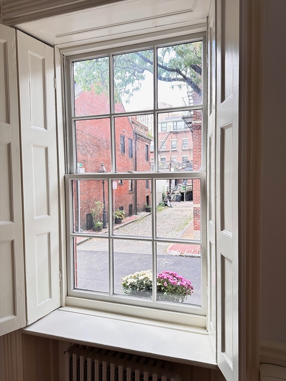 24 Fayette Street, Unit 24 Boston, MA 02116 - Photo 4 of 36 a view of a glass door with a window