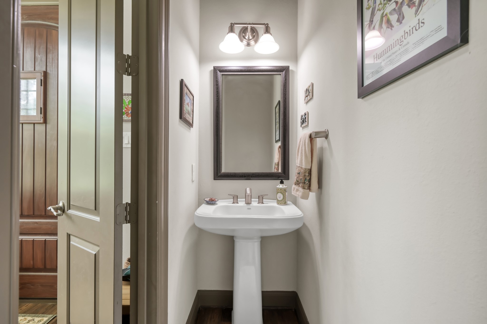 18 Aventura Place Spring, TX 77389 - Photo 8 of 43 a bathroom with a sink and a mirror