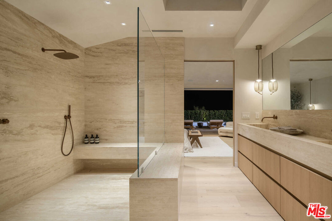 1718 Rising Glen Road Los Angeles, CA 90069 - Photo 10 of 19 a view of a bathroom with bathtub and shower