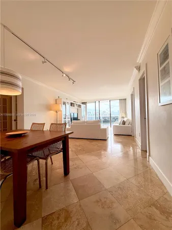 a view of a hallway with seating area