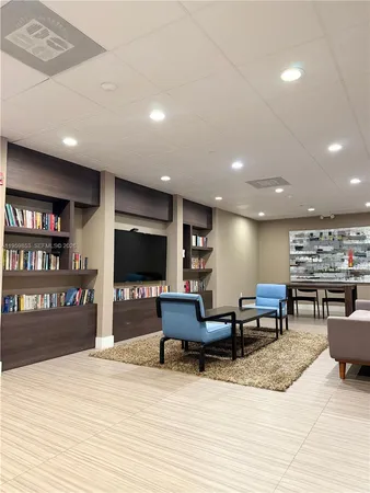 a room with furniture and wooden floor