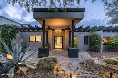 a view of a living room and dining room