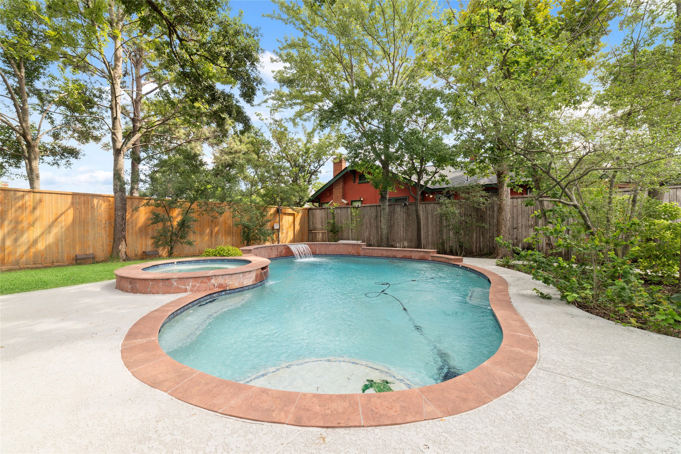 1613 California Street Houston, TX 77006 - Photo 36 of 50 It's easy to imagine summer afternoons stretching into evenings here, the waterfall gently in the background while friends gather beneath the trees. Some of the very best homes quietly become part of your family's traditions.