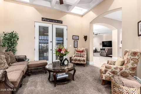 a large kitchen with stainless steel appliances granite countertop a sink a stove and a refrigerator