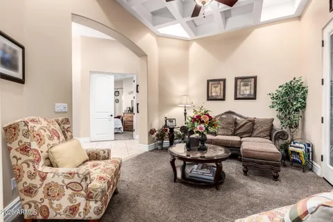 a view of a dining room with furniture and window