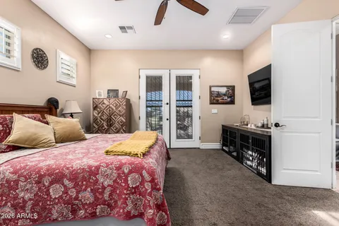 a bedroom with a bed and closet