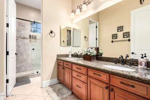 a view of a patio with a table and chairs