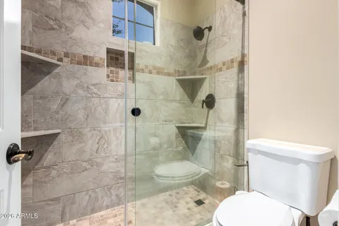 a view of a house with outdoor seating area