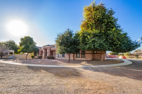 a view of a house with a swimming pool