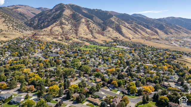 1143 East Mountain Road Logan, UT 84321 - Photo 59 of 64 Expansive neighborhood setting with established homes and mature trees, framed by mountainous terrain