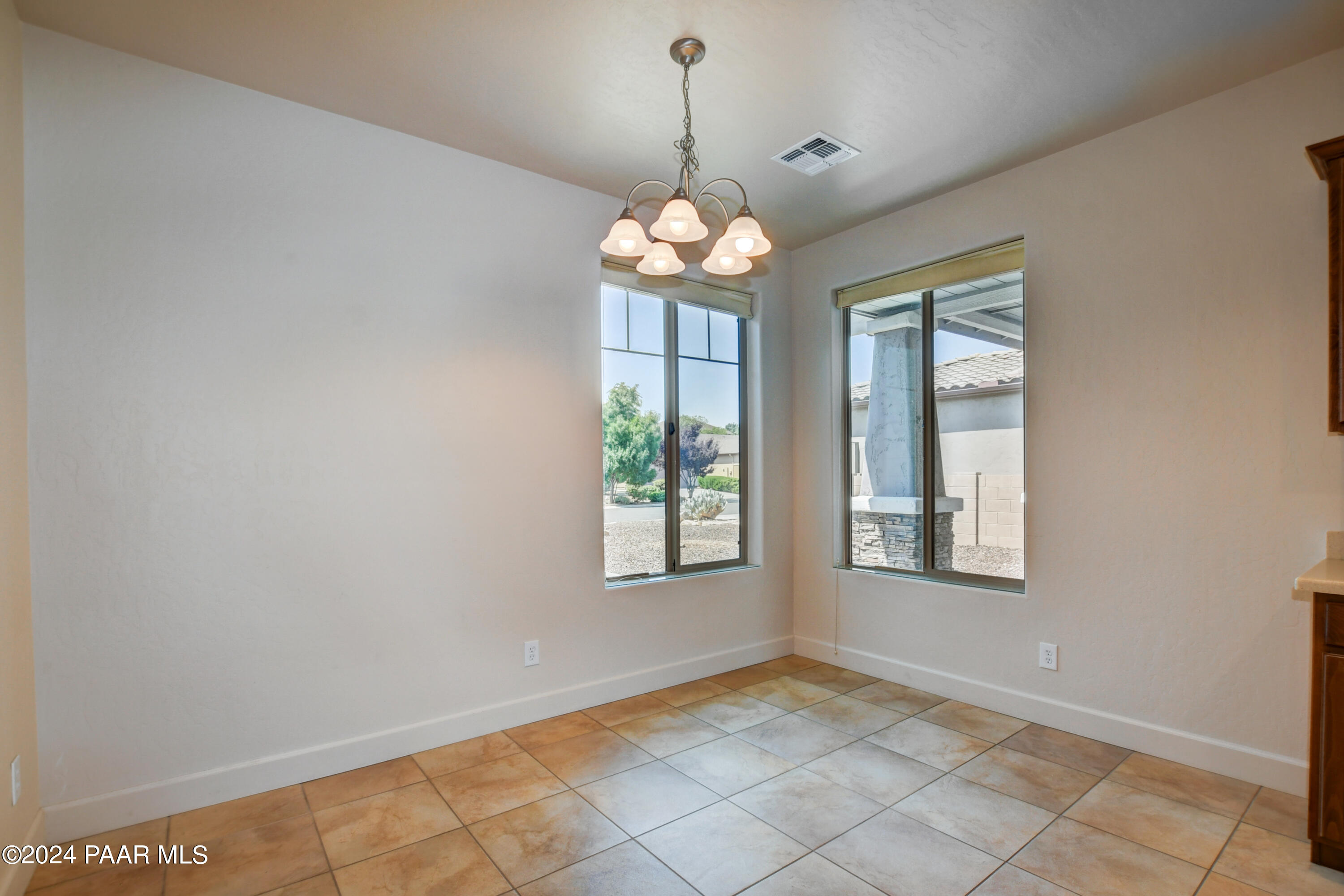 1147 Rusty Nail Road Prescott Valley, AZ 86314 - Photo 14 of 50 a view of an empty room with window
