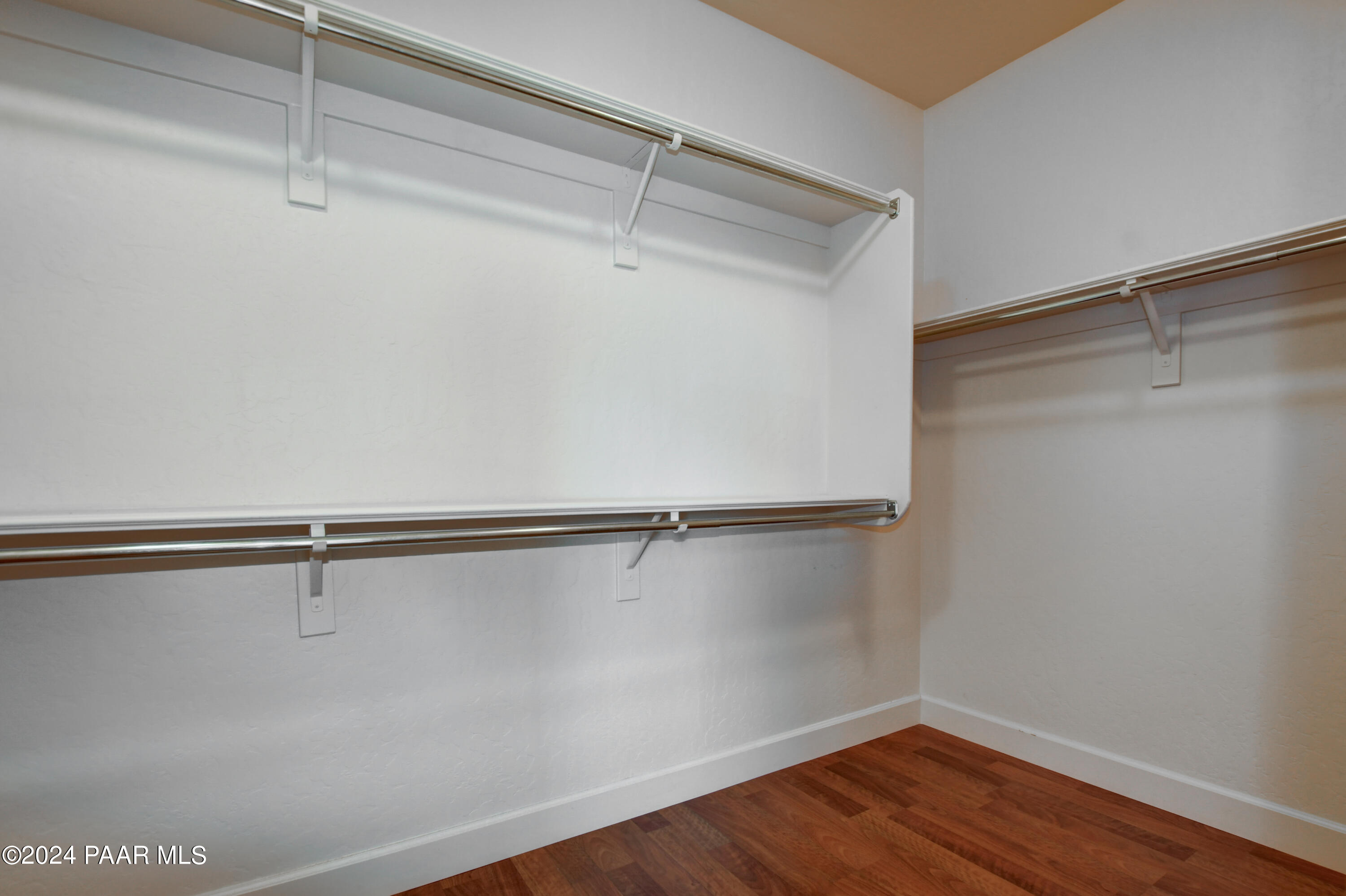 1147 Rusty Nail Road Prescott Valley, AZ 86314 - Photo 19 of 50 a view of a room with racks on the wall