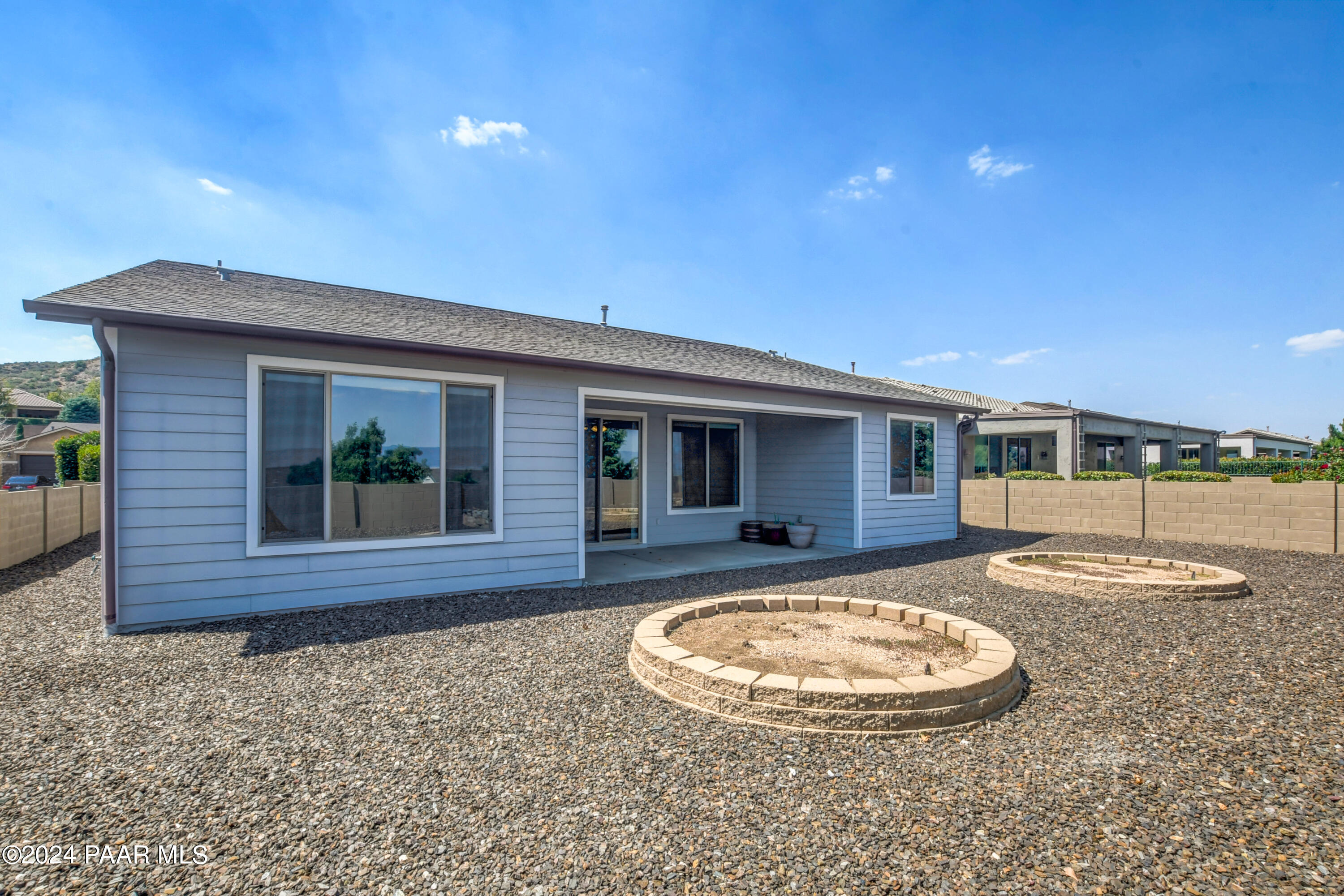 1147 Rusty Nail Road Prescott Valley, AZ 86314 - Photo 23 of 50 a front view of a house with garden