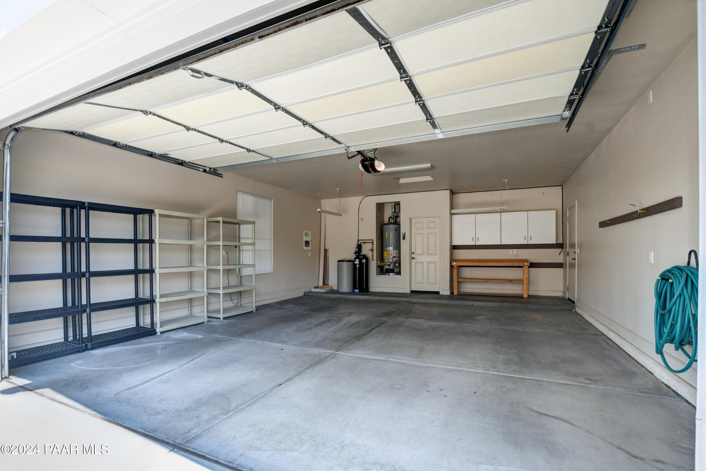 1147 Rusty Nail Road Prescott Valley, AZ 86314 - Photo 28 of 50 a view of an empty room with a window