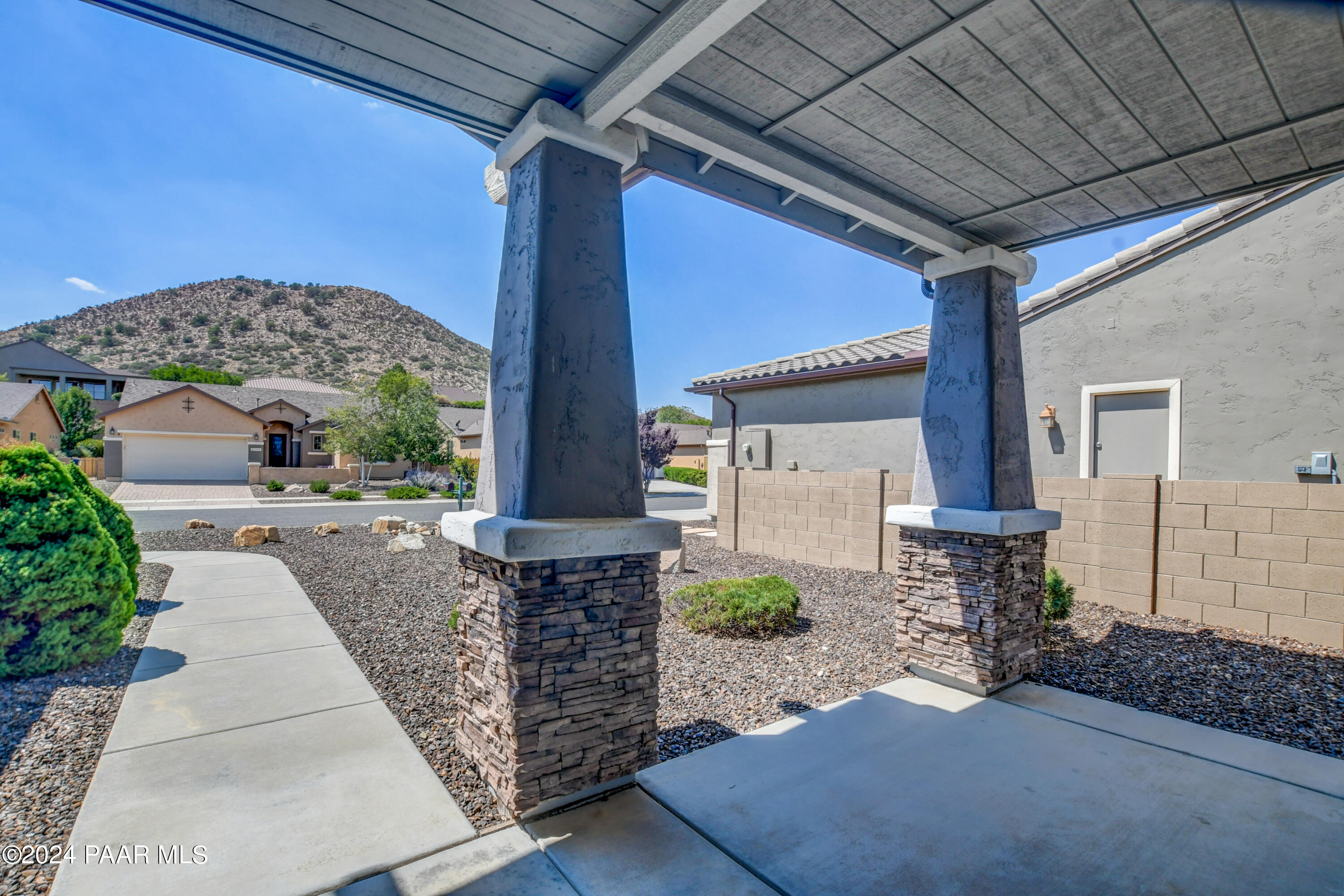 1147 Rusty Nail Road Prescott Valley, AZ 86314 - Photo 3 of 50 a front view of a house with garden