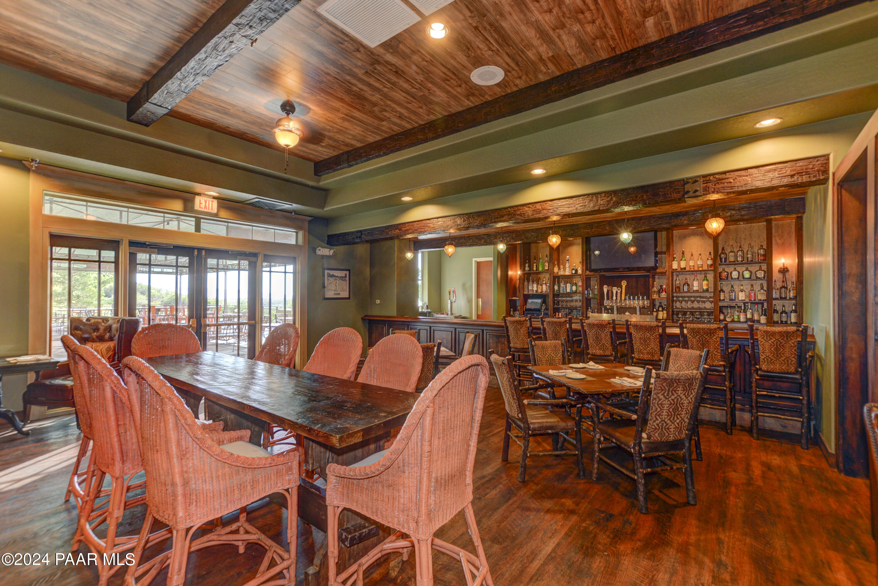 1147 Rusty Nail Road Prescott Valley, AZ 86314 - Photo 36 of 50 a dining room with furniture and wooden floor