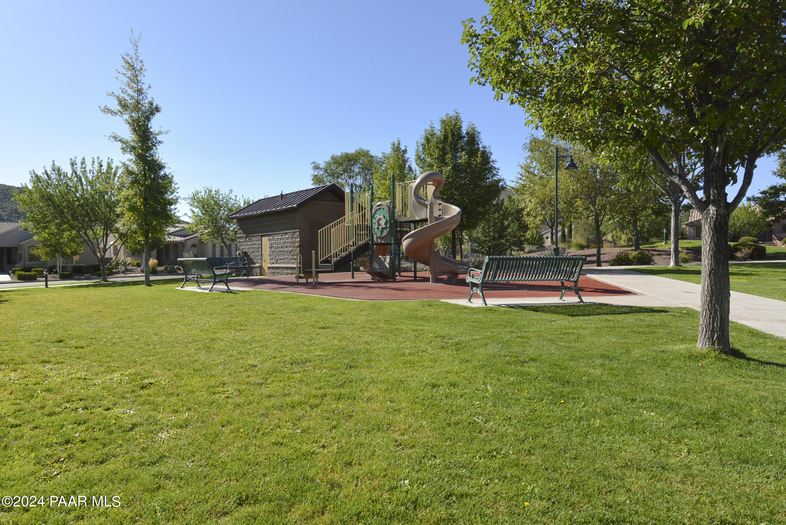 1147 Rusty Nail Road Prescott Valley, AZ 86314 - Photo 47 of 50 a view of a park with swings and slides