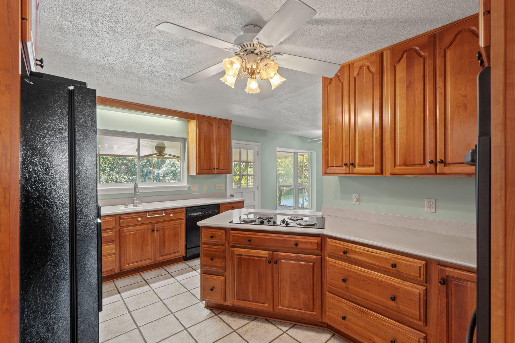 20 Linwood Road Northwest Fort Walton Beach, FL 32547 - Photo 13 of 33 a kitchen with granite countertop stainless steel appliances sink cabinets and window