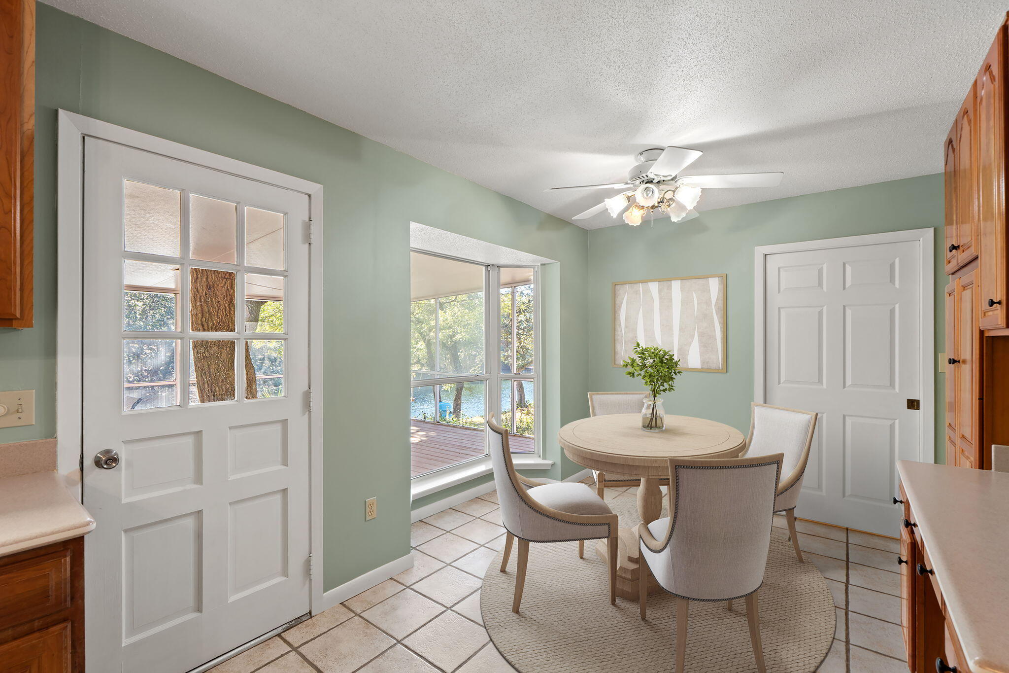 20 Linwood Road Northwest Fort Walton Beach, FL 32547 - Photo 16 of 33 a dining room with furniture a chandelier and wooden floor