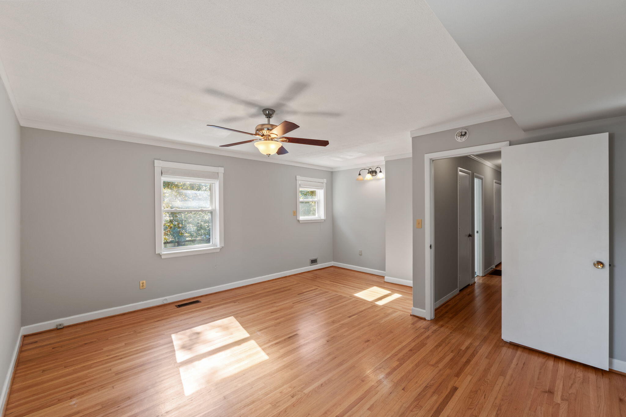 20 Linwood Road Northwest Fort Walton Beach, FL 32547 - Photo 17 of 33 wooden floor in an empty room with a window