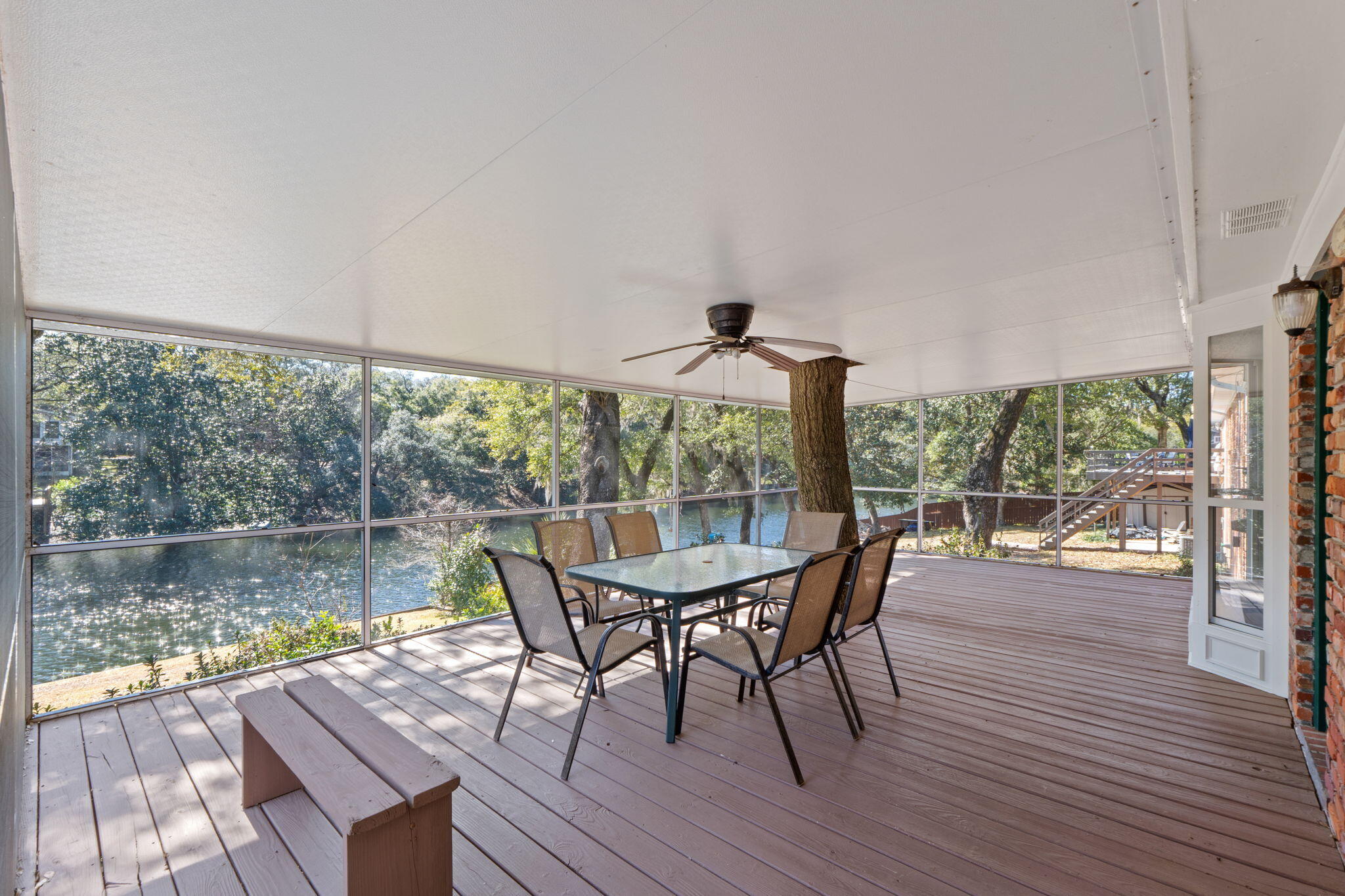 20 Linwood Road Northwest Fort Walton Beach, FL 32547 - Photo 30 of 33 a view of a porch with furniture and wooden floor