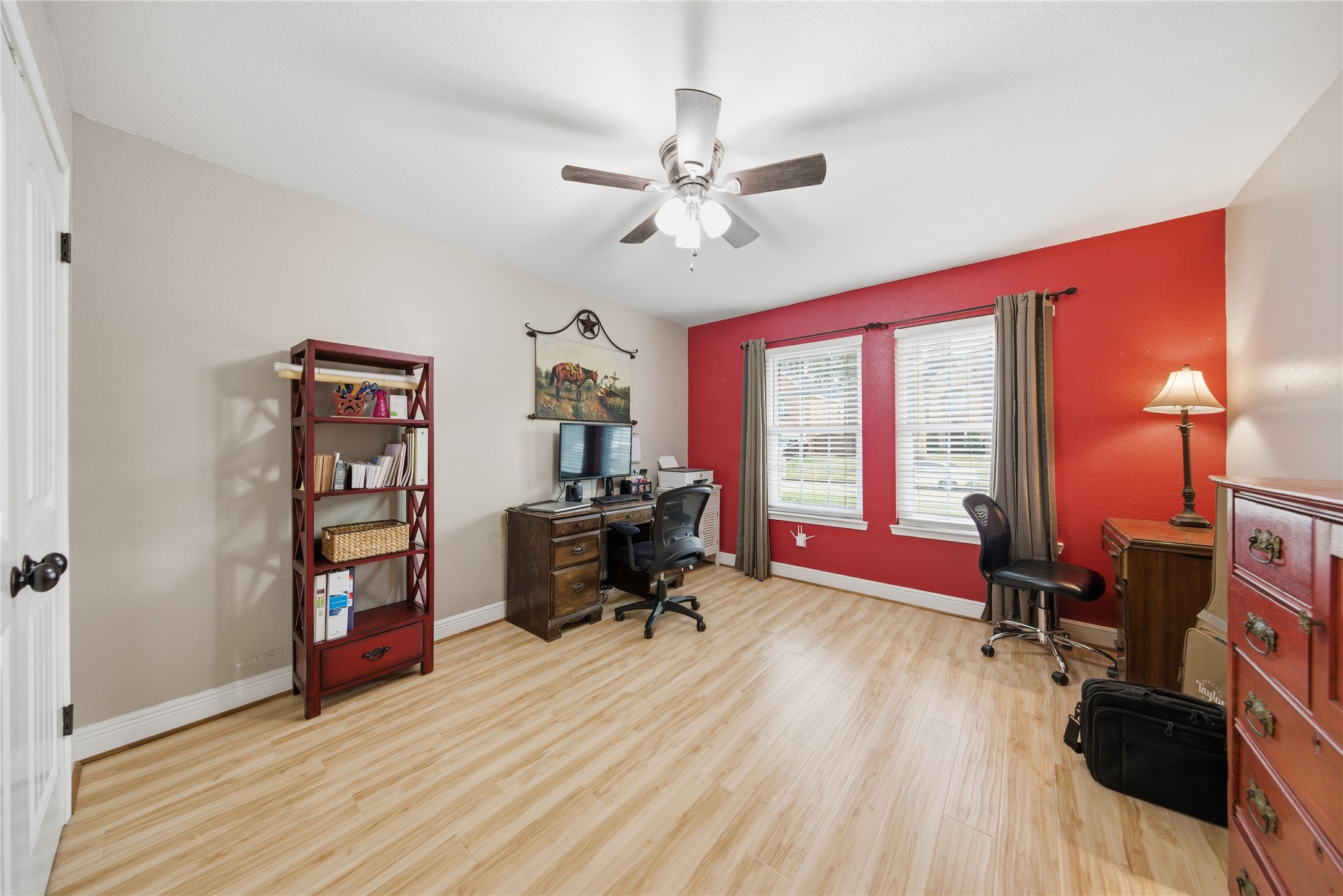 13506 Spring Court Tomball, TX 77375 - Photo 18 of 30 a view of a workspace with furniture and a window