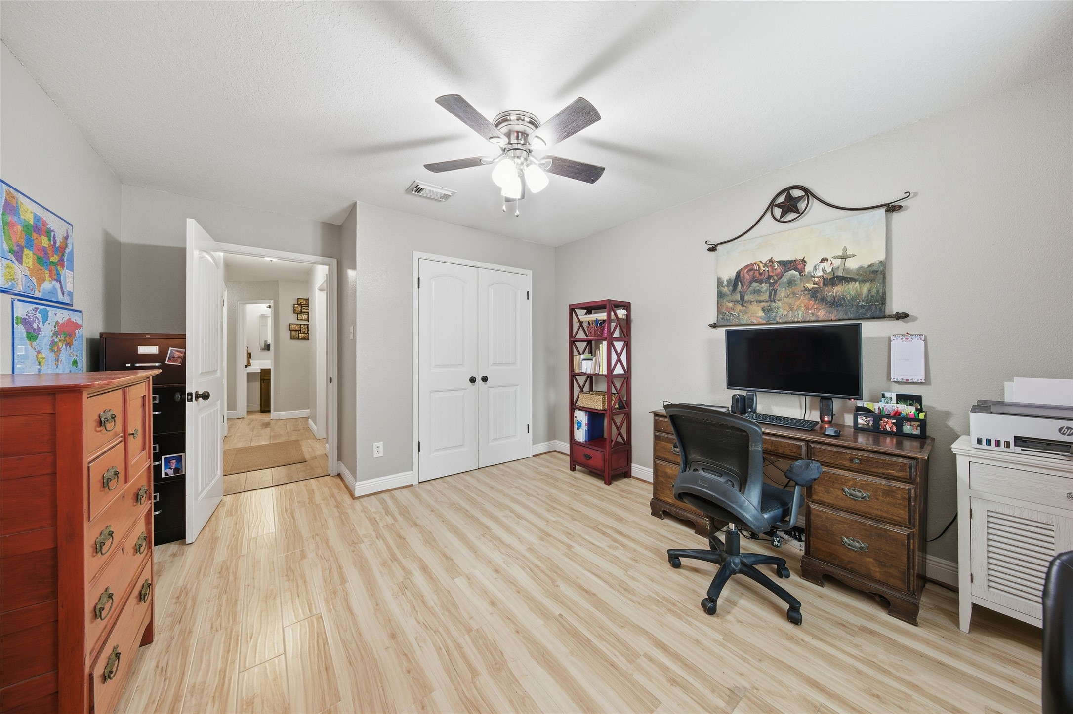 13506 Spring Court Tomball, TX 77375 - Photo 19 of 30 a view of a workspace with furniture and a bedroom