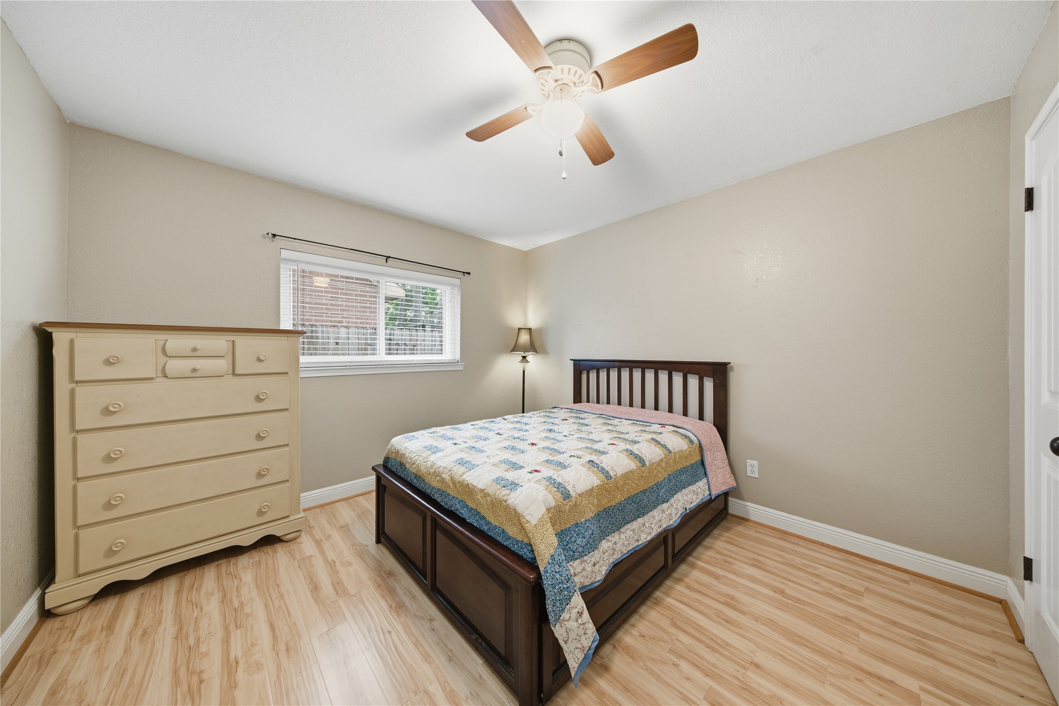 13506 Spring Court Tomball, TX 77375 - Photo 20 of 30 a bed room with a bed and a window
